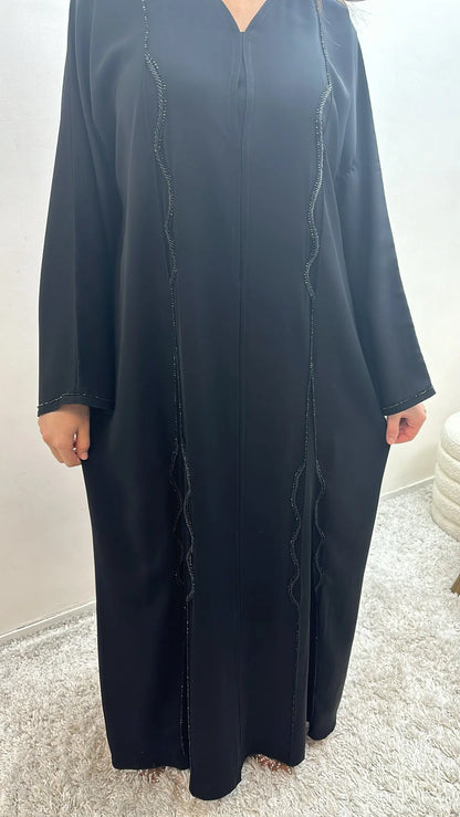 ABAYA DUBAI EN NIDHA CORÉEN Mana